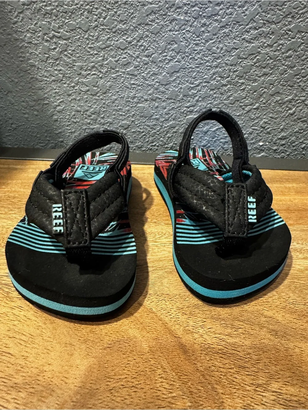 Reef baby/toddler Black Flip Flops with Teal & Coral Palm Print